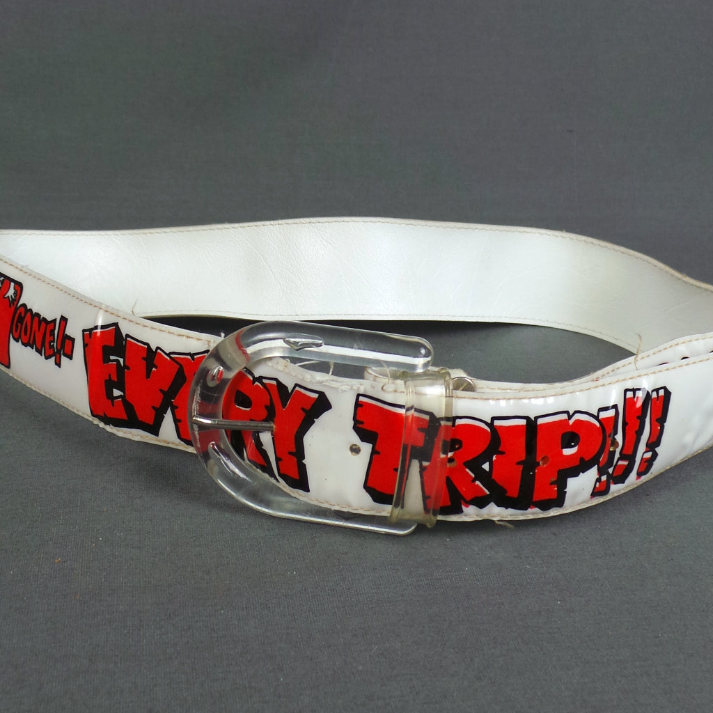 1970s White and Red Rare Raunchy Vinyl 'Clunk Click Every Trip' Vintage Advertising Belt