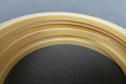1940s Cream and Red Stack of Six Carved Bangles